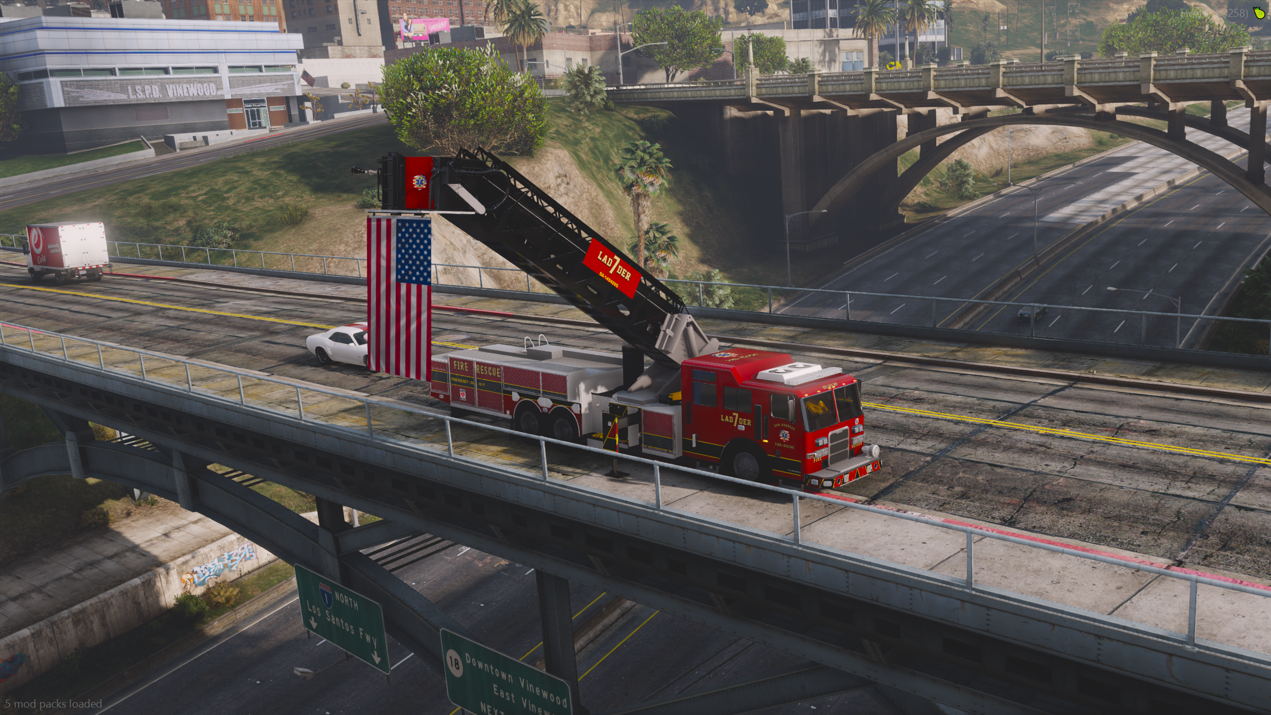 Lore mid-mount ladder firetruck